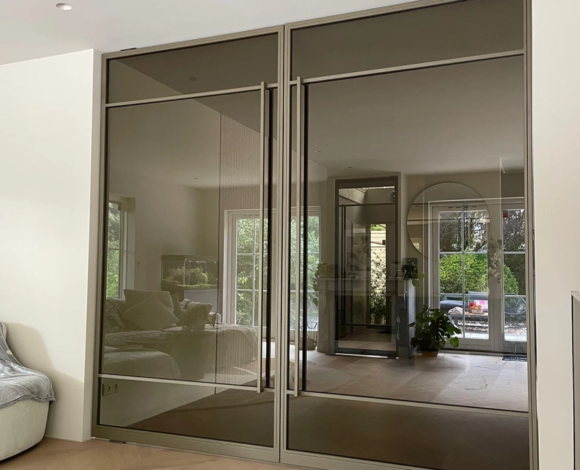 Dubbele stalen taatsdeur Groningen groen met getint glas